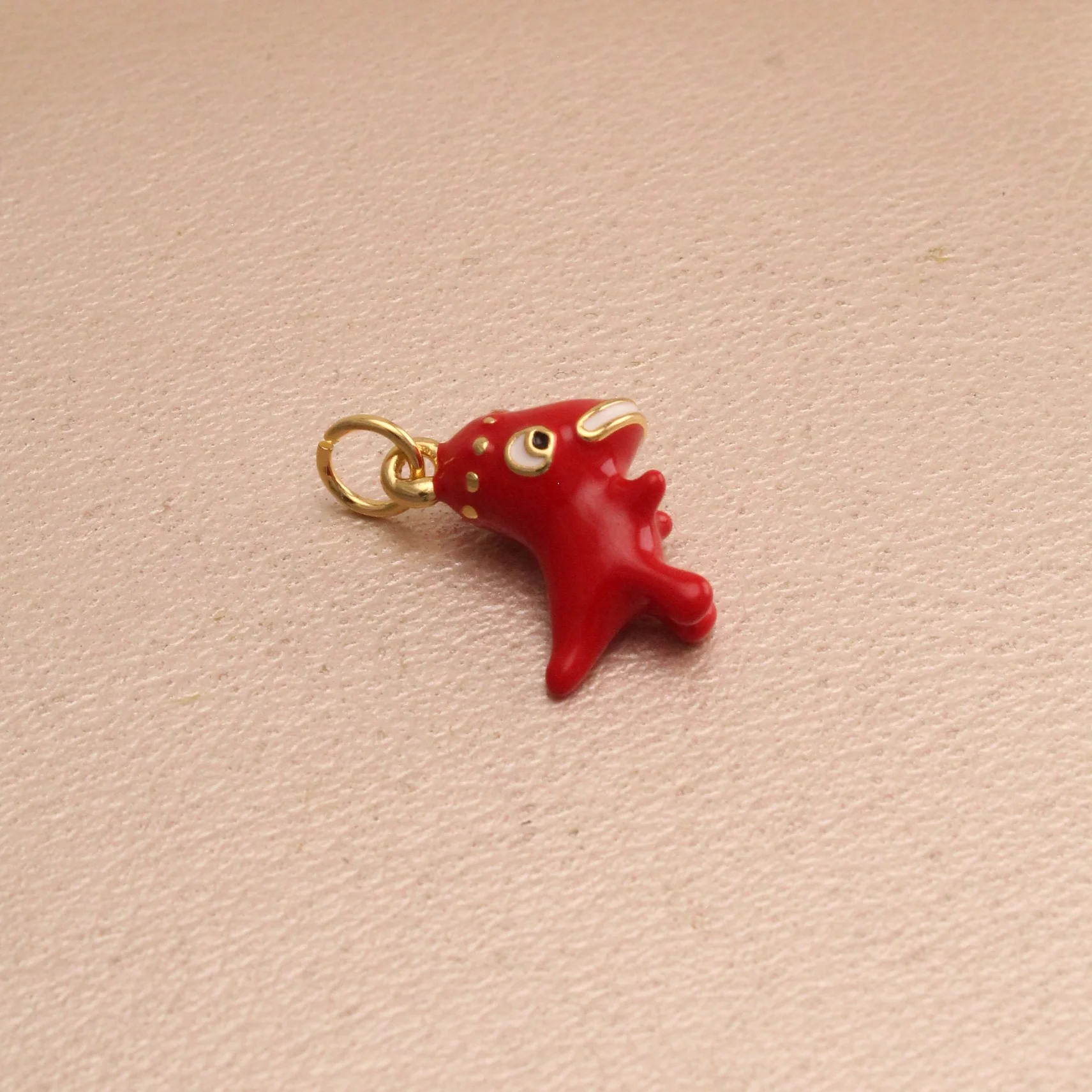 Dij. dinosaurio rojo rodio 2,5cm - DRG119